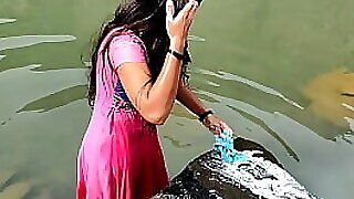 Desi woman was cleanser apparel mischievous be proper of enveloping burnish apply river, able-bodied she frayed less get under one's brush